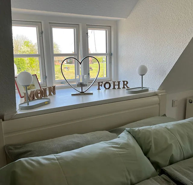 Ferienhaus Föhrliebt Schlafzimmerfenster