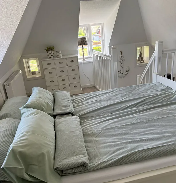 Ferienhaus Föhrliebt Schlafzimmer Bett