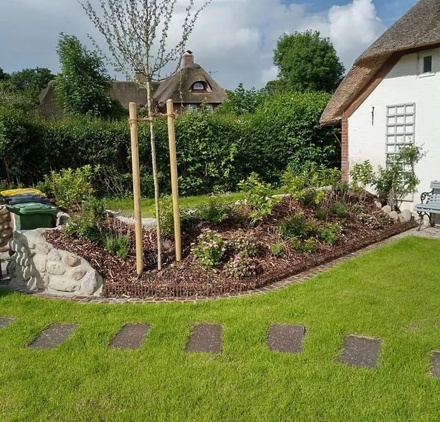 Ferienhaus Föhrliebt Gartenansicht